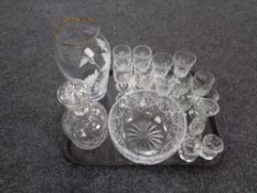 A tray containing assorted glassware to include decanter, assorted drinking glasses, vase,