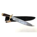 A Down Under Knives 'Toothpick' knife in leather sheath.