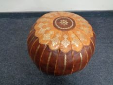 A Moroccan leather footstool