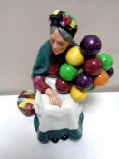 A Royal Doulton figure, The Old Balloon Seller,