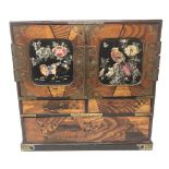 A Japanese Meiji period parquetry table cabinet with mother of pearl inlay,