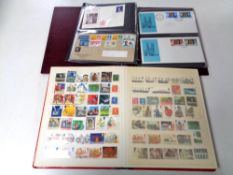 A box of six stock book collections of world stamps,