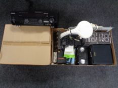 A Kenwood KRF-V7030D Audio Video surround receiver together with a further box containing