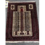 An Afghan prayer rug 131 x 100 cm