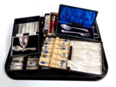 A tray containing a quantity of cased plated cutlery to include teaspoons,