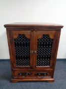 A William Sheppee Indian Collection Tansen double door TV cabinet