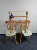 A set of four pine farmhouse kitchen chairs and a pine towel rail