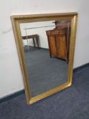 A gilt framed mirror