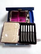 A tray containing boxed and unboxed cutlery to include fish knives and forks, butter knives,