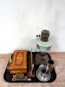 A tray of antique cast iron oil lamp with hand painted glass reservoir and chimney,