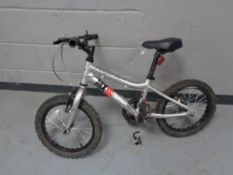 A child's Ridgeback MX16 terrain bicycle