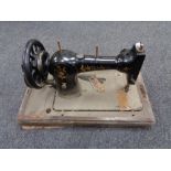 An early 20th century Jones hand sewing machine