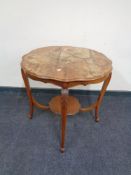 A shaped Edwardian occasional table