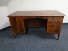 A continental stained beech writing desk