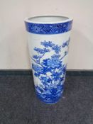 A blue and white porcelain stick pot in oriental design,