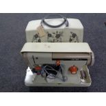 A cased Jones B41 electric sewing machine