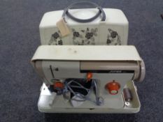 A cased Jones B41 electric sewing machine