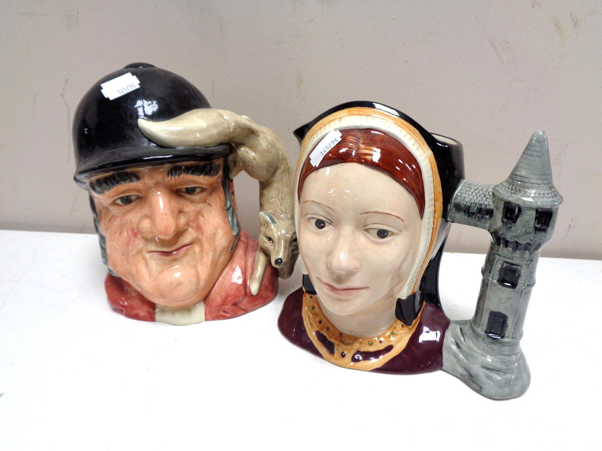 Two Royal Doulton character jugs : Catherine of Aragon D6643 and Gone Away D6351