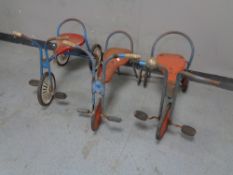 Three mid 20th century tricycles by Mobo Tri-ang