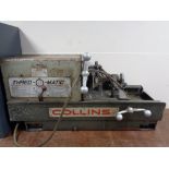 A Collins industrial thread-o-matic pipe threading machine