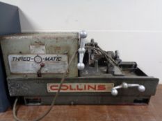 A Collins industrial thread-o-matic pipe threading machine