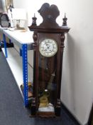 A Walker and Hall Vienna wall clock with pendulum,