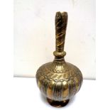 A 19th century Indo-Persian brass bulbous vase,