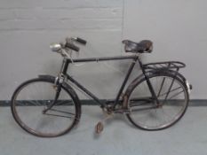 A vintage bicycle with sprung seat