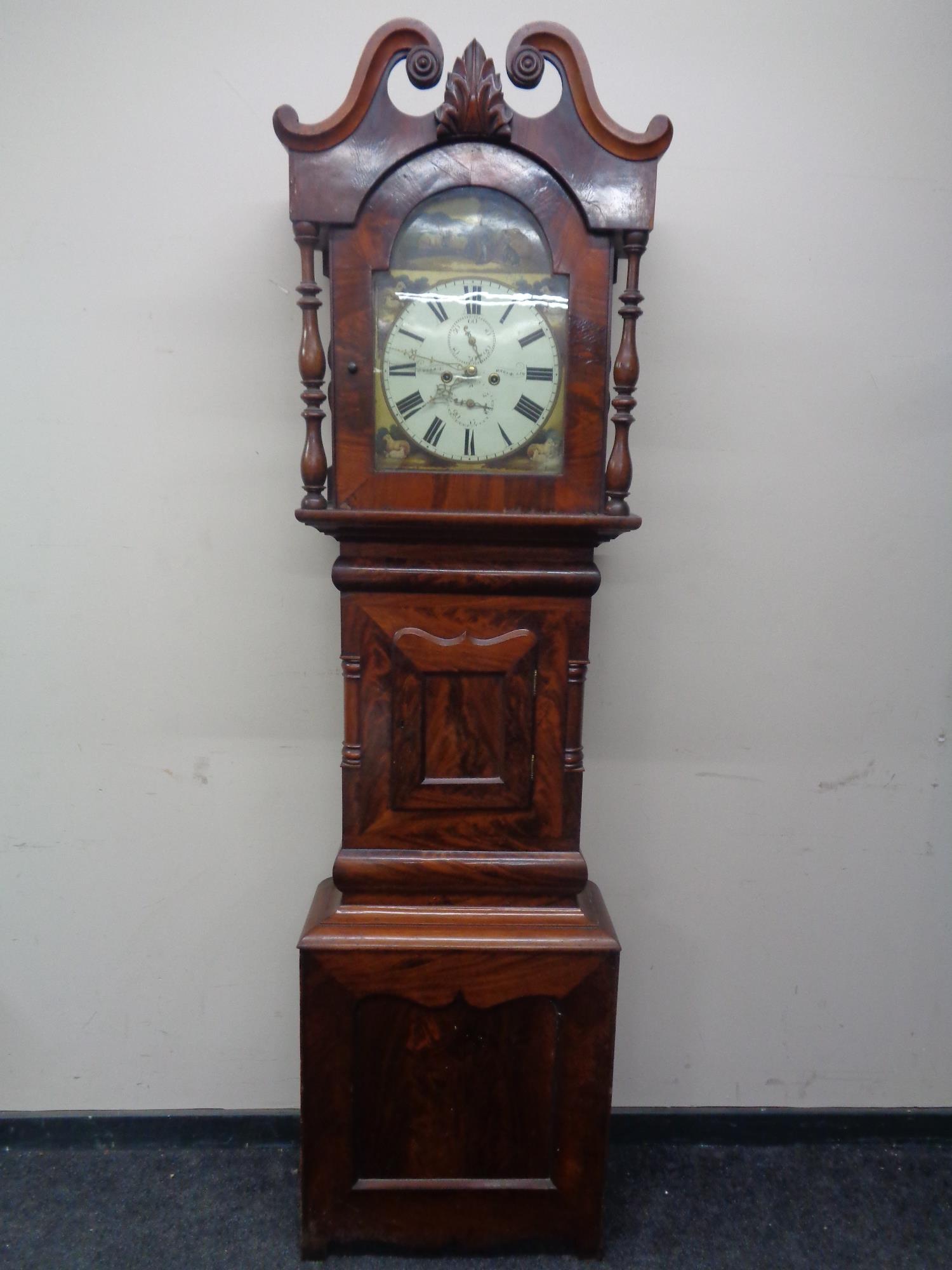 A 19th century mahogany longcase clock with painted dial signed J.
