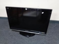 A Panasonic 32'' LCD TV with remote