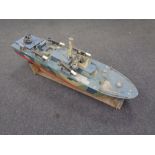 A hand built remote controlled boat, military cruiser,