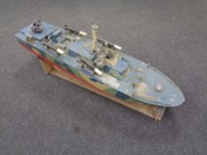 A hand built remote controlled boat, military cruiser,