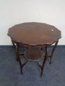 A shaped Edwardian occasional table