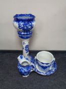 An Ironstone blue and white glazed pottery jardiniere on stand,