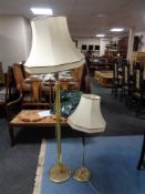A brass standard lamp and shade,