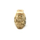 A carved Chinese bone netsuke - Gentleman holding a basket