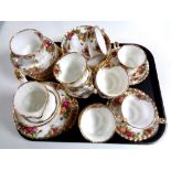 A tray containing forty-three pieces of Royal Albert Old Country Roses tea china