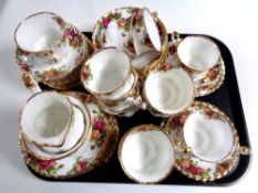 A tray containing forty-three pieces of Royal Albert Old Country Roses tea china