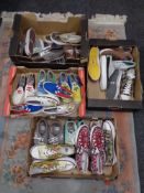 Four boxes containing a quantity of Zipz interchangeable shoes