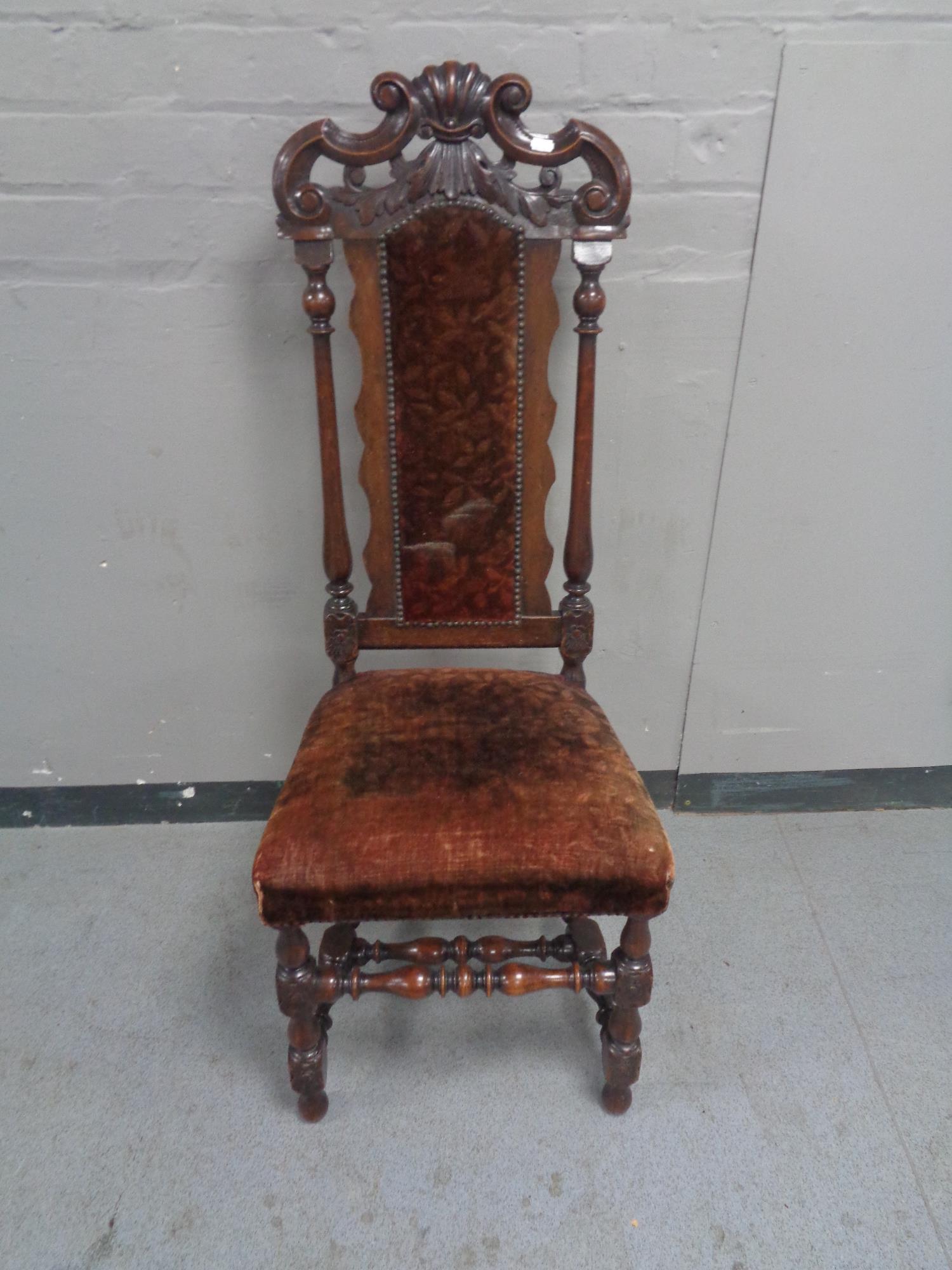 A late 19th century stained beech hall chair