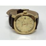 A Gentleman's Moscow time wrist watch on brown leather strap