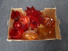 A box of ruby and amber glass ware