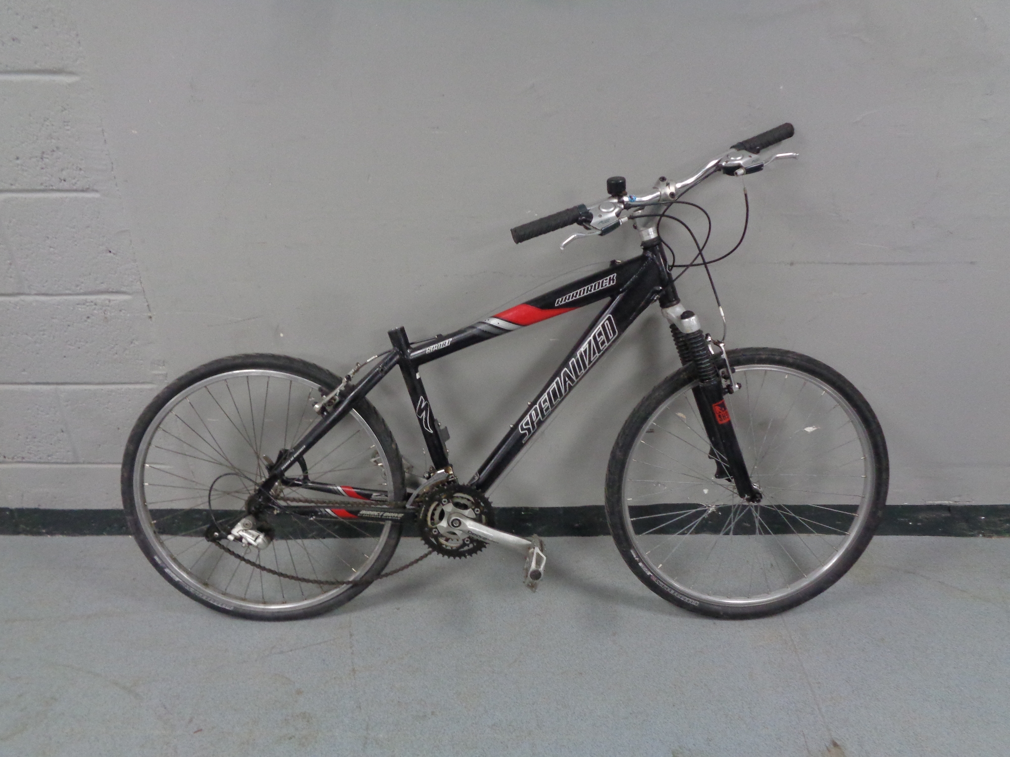 A Specialised Hardrock front suspension mountain bike (no seat)