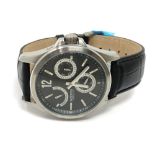 A Gentleman's Reserver automatic wrist watch on black leather strap
