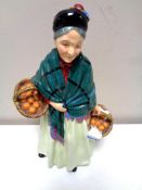 A Royal Doulton figure, The Orange Lady,