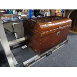 A guitar flight case together with an early 20th century tin trunk