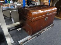 A guitar flight case together with an early 20th century tin trunk