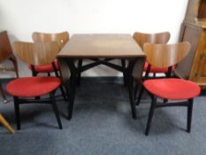 A six piece mid 20th century G-Plan teak dining room suite comprising of room divider,