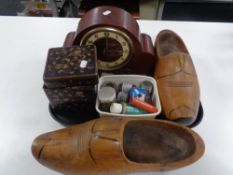 A tray of a pair of wooden clogs, modelling paint, lacquered four tier box containing shells,