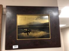 A Japanese print on panel depicting a mountainous landscape in a lacquered frame,